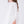 Charger l'image dans la galerie, Close-up of feather trim cuffs on ivory long sleeve girls occasion dress with structured fabric.
