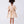 Carica l'immagine nel visualizzatore Galleria, Back view of gold girls occasion dress with structured silhouette and gathered skirt from Golden Amara collection.
