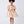 Carica l'immagine nel visualizzatore Galleria, Front view of gold metallic girls dress with puff sleeves, floral shoulder embellishment and statement waist bow.
