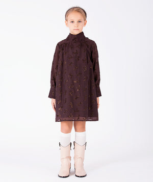 Front view of Shimmering Mocha Girls Dress with long sleeves and shimmering bow details for girls ages 3 to 12 by Mama Luma.