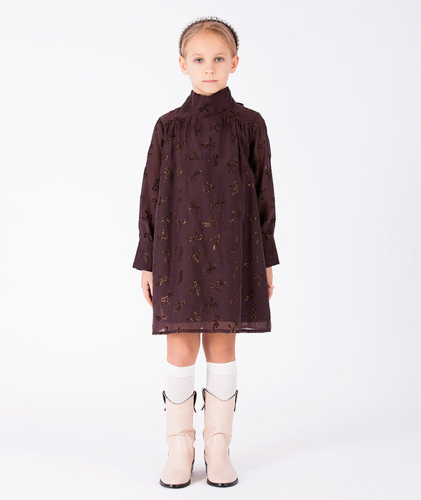 Front view of Shimmering Mocha Girls Dress with long sleeves and shimmering bow details for girls ages 3 to 12 by Mama Luma.