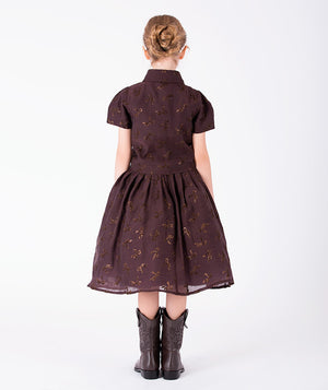 Back view of Shimmering Mocha Girls Outfit with a full midi skirt and shimmering bow motifs for girls ages 3 to 12 by Mama Luma.
