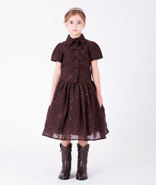 Front view of Shimmering Mocha Girls Outfit featuring a short-sleeve top and matching midi skirt for girls ages 3 to 12 by Mama Luma.