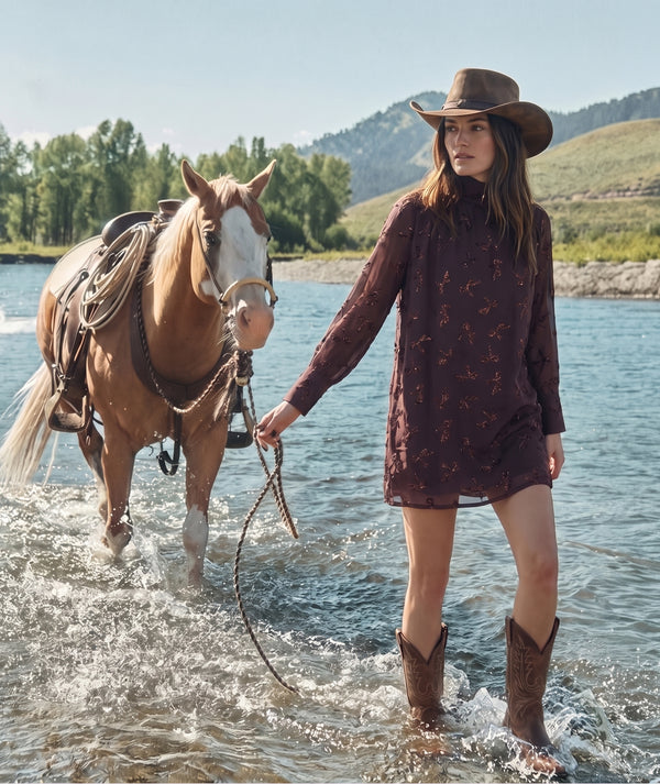 Shimmering Mocha Women's Dress styled beside a horse in an outdoor riverside editorial setting.