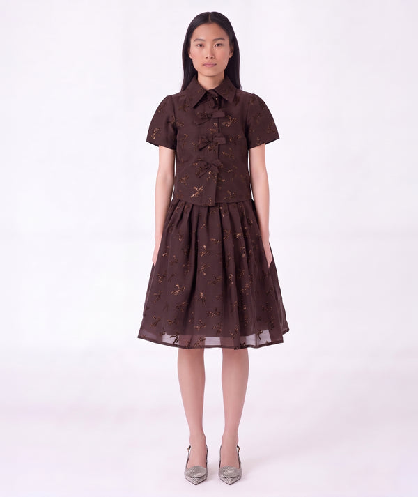 Front view of Shimmering Mocha Women's Outfit featuring a structured bow-detailed top and matching gathered midi skirt by Mama Luma.