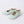 Charger l'image dans la galerie, Pair of light green shoes with clear soles on a white background
