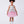 Load image into Gallery viewer, 4 years old girl wearing a silver top and pink skirt with white boots on a white background
