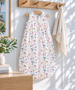Ocean-print baby sleep sack for bedtime and nursery use.