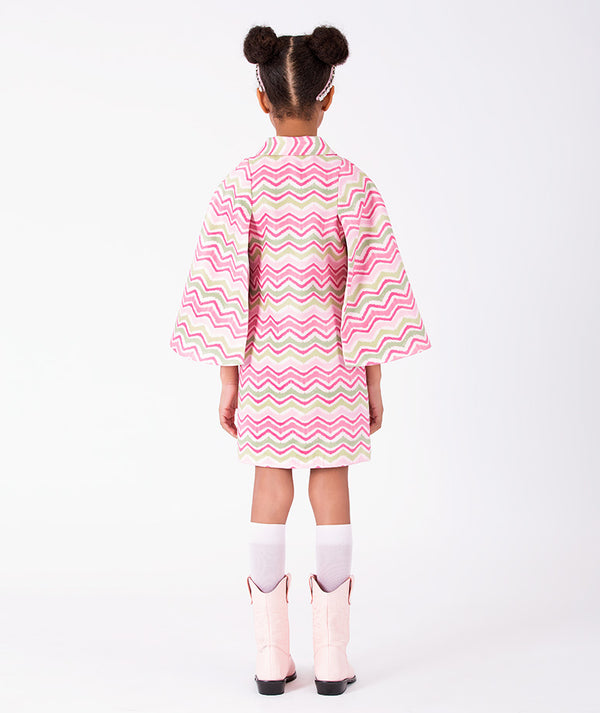 Back view of Strawberry Girls Zigzag Jacket in green jacquard for girls ages 3 to 12, highlighting overall silhouette and styling