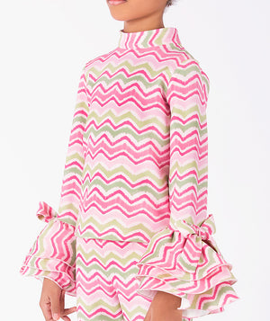Editorial view of Strawberry Girls Zigzag Outfit | 2 Pieces in green jacquard for girls ages 3 to 12, featuring fabric texture and color