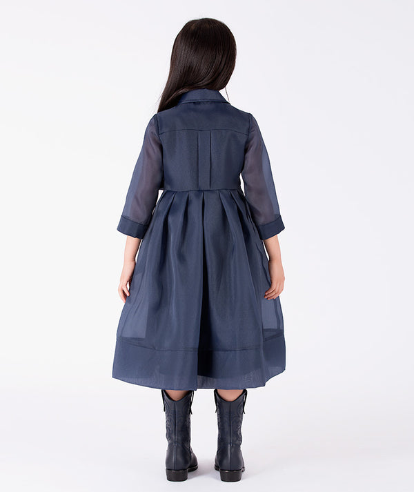 Back view of Structured Girls Trench Dress in navy organza for girls ages 3 to 12, showing the silhouette and refined construction