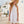 Load image into Gallery viewer, Editorial view of Sun Appliqués Girls Linen Dress for girls ages 3 to 12, featuring fabric texture and color
