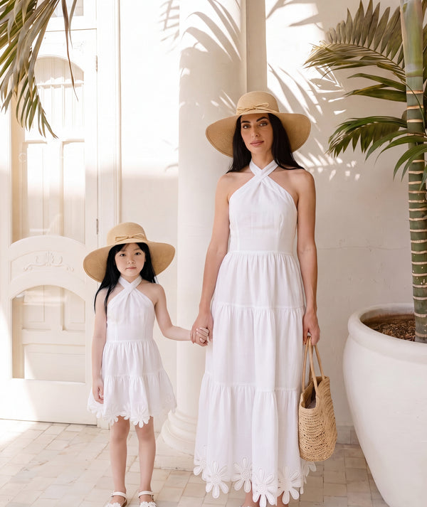 Editorial view of Sun Appliqués Linen Women's Dress, featuring fabric texture and color