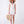 Load image into Gallery viewer, Editorial view of Sun Appliqués Women's Linen Outfit | 2 Pieces, featuring fabric texture and color
