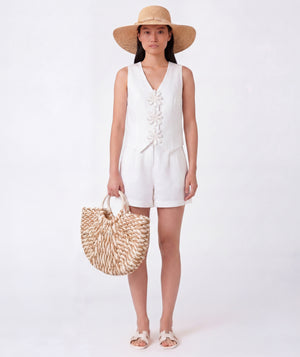 Editorial view of Sun Appliqués Women's Linen Outfit | 2 Pieces, featuring fabric texture and color