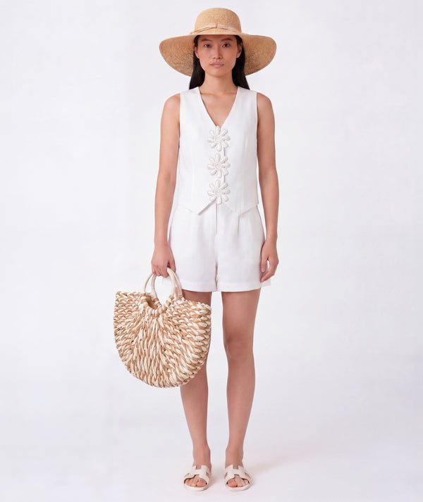 Editorial view of Sun Appliqués Women's Linen Outfit | 2 Pieces, featuring fabric texture and color