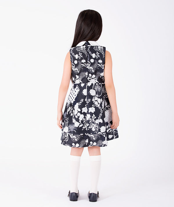 Back view of Suva Maia Collared Girls Dress in ivory for girls ages 3 to 12, showing the silhouette and refined construction