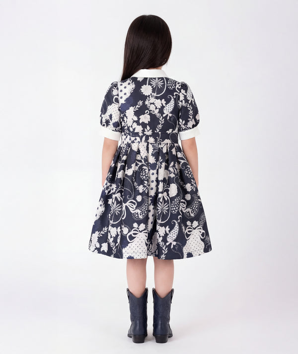 Back view of Suva Maia Girls Dress in ivory for girls ages 3 to 12, showing the silhouette and refined construction