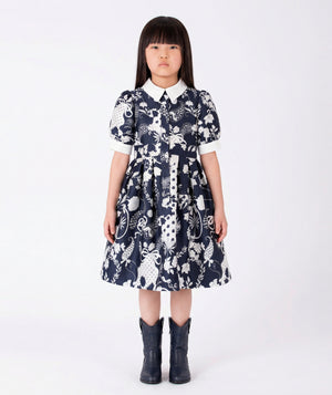 Front view of Suva Maia Girls Dress in ivory for girls ages 3 to 12, a premium children’s design by Mama Luma