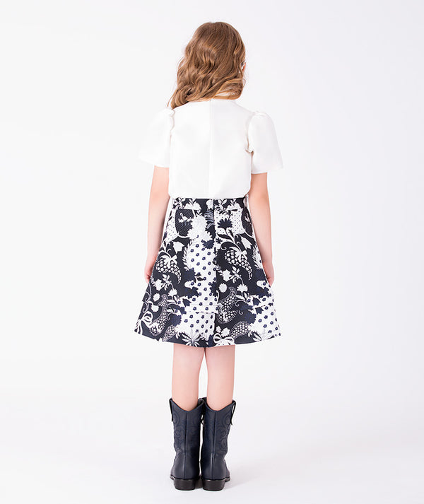 Back view of Suva Maia Girls Outfit | 2 Pieces in ivory for girls ages 3 to 12, showing the silhouette and refined construction