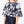 Load image into Gallery viewer, Editorial view of Suva Maia Girls Tassel Outfit | 2 Pieces in ivory for girls ages 3 to 12, styled for weddings, birthdays and special occasions
