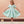 Load image into Gallery viewer, Editorial view of Swan Pearl Mint Girls Dress in mint satin for girls ages 3 to 12, featuring fabric texture and color
