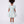 Load image into Gallery viewer, Back view of Swan Pearl Short Sleeve Girls Dress in ivory cotton for girls ages 3 to 12, highlighting tailoring, closure and finishing
