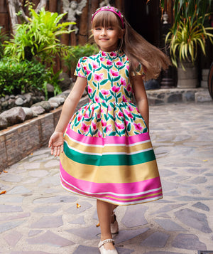 vibrant floral print dress with playful stripes in green, pink, and yellow