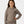 Carica l'immagine nel visualizzatore Galleria, Front-facing cropped lifestyle image of a girl wearing a taupe hoodie styled with ribbed pants, designed for cozy school outfits, relaxed layering, and everyday comfort, available in sizes 3–14
