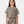 Charger l'image dans la galerie, Front-facing lifestyle image of a girl wearing a taupe cropped short sleeve t-shirt layered over matching ribbed pants, styled for contemporary everyday outfits, school comfort, and relaxed movement, available in sizes 3–14
