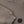 Carica l'immagine nel visualizzatore Galleria, Close-up detail of a taupe girls hoodie highlighting the ribbed sleeve cuff, soft knit texture, and minimalist chest emblem, designed for everyday wear, school outfits, and casual layering, available in sizes 3–14
