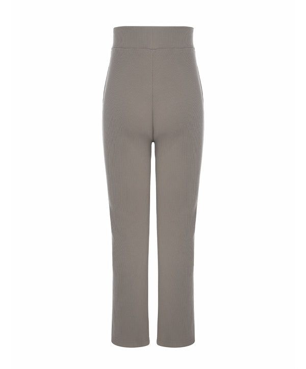 Back view of taupe girls pants with a high elastic waistband and straight-leg fit, designed for everyday wear, school outfits, and casual looks, available in sizes 3–14