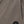 Charger l'image dans la galerie, Close-up detail of taupe girls pants highlighting the elastic waistband seam, vertical panel stitching, and minimalist emblem, designed for everyday wear, school outfits, and casual looks, available in sizes 3–14
