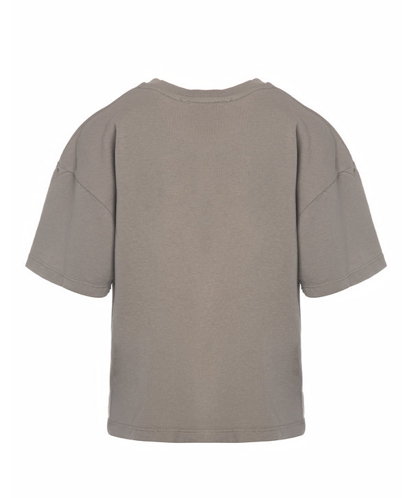 Back view of a taupe short sleeve girls t-shirt with a relaxed fit and soft knit texture, designed for everyday wear, school outfits, and casual outings, available in sizes 3–14
