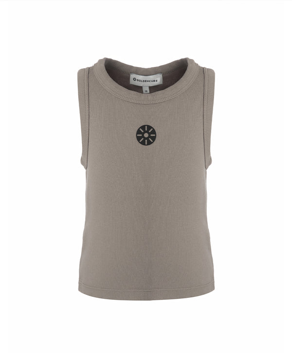 Front view of a taupe girls sleeveless tank top with a ribbed texture and minimalist chest emblem, designed for everyday wear, school outfits, and casual looks, available in sizes 3–14