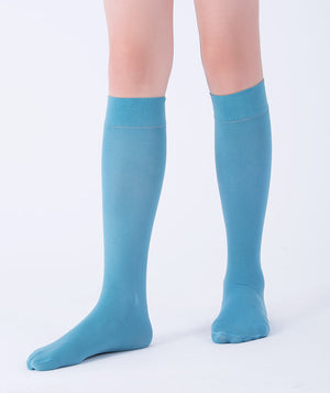 Front view of azure blue knee-high kids socks, cotton blend designed in Europe, versatile for school uniforms, birthdays, and special occasions.