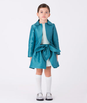 Girl wearing a teal satin jacket and matching bow skirt outfit (3–12Y) — perfect for weddings, family portraits, and elegant festive gatherings