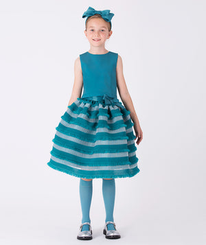 Girl wearing a teal striped sleeveless dress (3–12Y) with a full ruffle skirt and matching bow headband — perfect for weddings, parties, and festive celebrations
