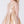 Charger l'image dans la galerie, Close-up of sheer dotted tulle long sleeves on gold girls occasion dress with structured bodice.
