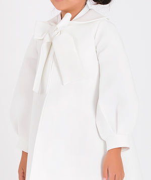 Elegant white jacket with puffed sleeves and bow detail