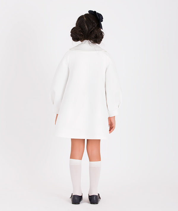 Chic white jacket for girls featuring a bow accent and structured design