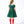 Load image into Gallery viewer, Back view of Mama Luma Zermatt Enchanting Bow Girls Holiday Dress showing the folded shoulder detail, concealed zipper, and pleated emerald-green skirt.

