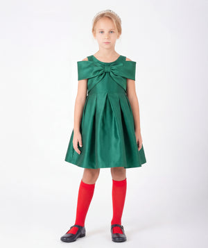 Front view of Enchanting Bow Girls Holiday Dress in emerald green with an off-the-shoulder bow and flared skirt for girls ages 3 to 12 by Mama Luma.