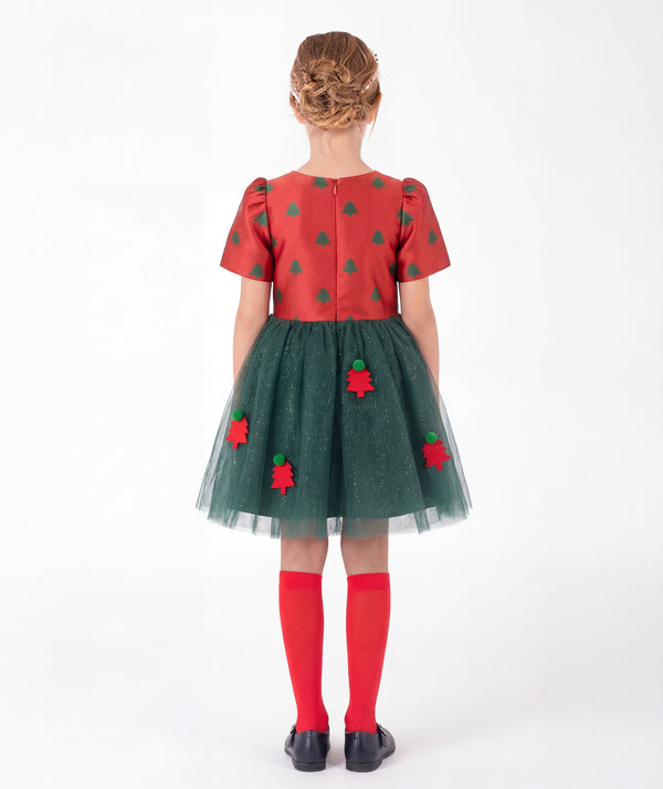 Back view of the Zermatt Floral Appliqué Girls Tulle Dress by Mama Luma, showing the concealed zipper, festive tree pattern, and layered green skirt.