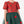 Charger l'image dans la galerie, Close-up of Mama Luma's festive girls' tulle dress featuring a red Christmas tree bodice, shimmering forest-green tulle, and dimensional holiday appliqués.
